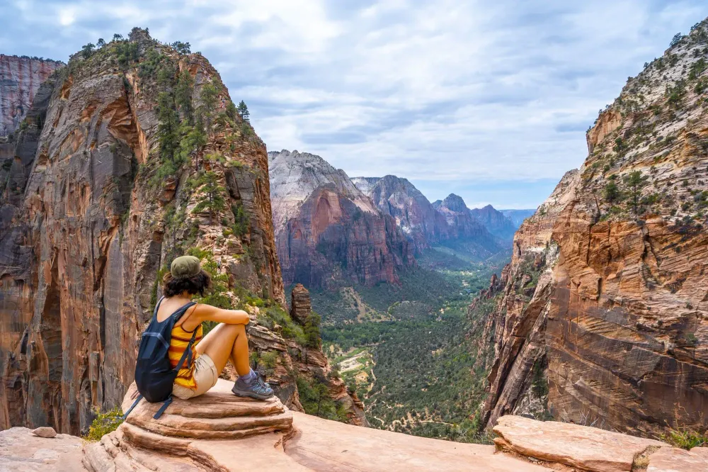 Young hiker sitting in Zion National Park